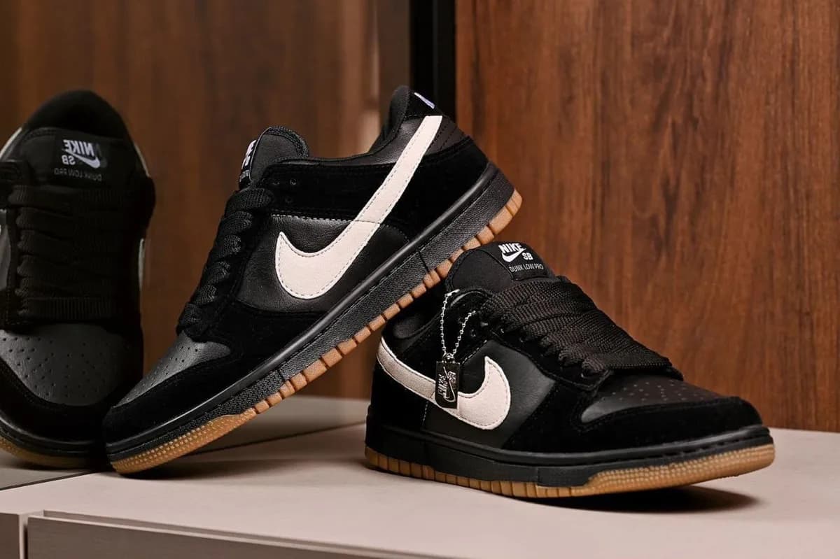 Nike Dunk Low preto com solado caramelo